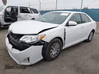 2014 Toyota Camry L with VIN 4T4BF1FK1ER416128, listed as a IAAI auction lot 42030370 with 79,475 mi miles and . Bid and sale history available at DreamBid. Image 2.
