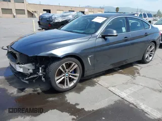 2015 BMW 4 Series 428i with VIN WBA4A5C59FGK15750, listed as a IAAI auction lot 42098856 with 62,530 mi miles and . Bid and sale history available at DreamBid. Image 19.