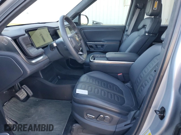 2023 Rivian R1T Adventure with VIN 7FCTGAAA7PN017844, listed as a Copart auction lot 44261105 with 4,590 mi miles and Clean Title. Bid and sale history available at carsss.com. Image 7.