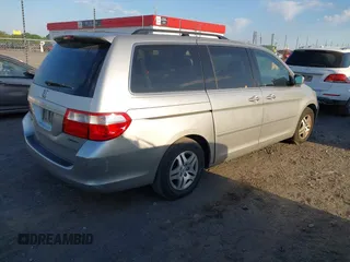 2007 Honda Odyssey EX-L z VIN 5FNRL38677B449602, wystawiony jako IAAI lot #42030774 z przebiegiem 179 563 mil mil oraz . Historia ofert i sprzedaży dostępna na DreamBid. Obrazek 4.
