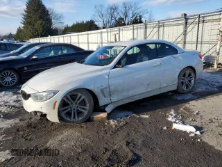 2015 BMW 4 Series 428i with VIN WBA3V7C54FP772674, listed as a Copart auction lot 88060515 with 95,980 mi miles and Salvage Title. Bid and sale history available at carsss.com. Image 1.