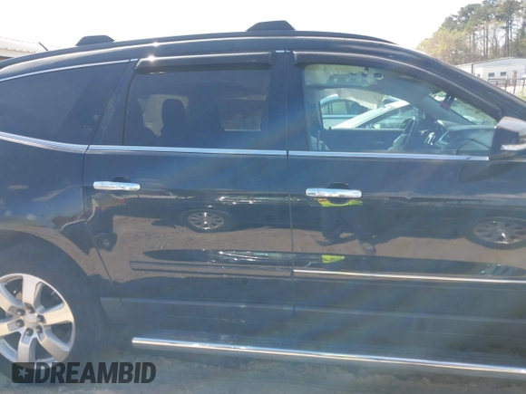 2016 Chevrolet Traverse LTZ with VIN 1GNKVJKD1GJ221893, listed as a IAAI auction lot 41913000 with 112,900 mi miles and . Bid and sale history available at DreamBid. Image 13.