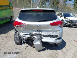 2018 Hyundai Tucson SEL with VIN KM8J3CA42JU771483, listed as a IAAI auction lot 42159936 with 91,604 mi miles and . Bid and sale history available at DreamBid. Image 17.