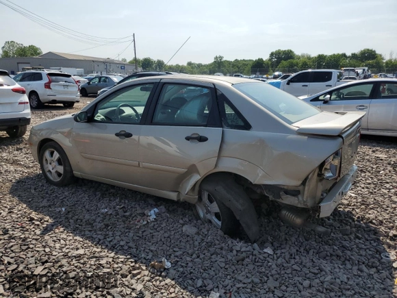 2006 Ford Focus S z VIN 1FAFP34N96W111431, wystawiony jako Copart lot #59478815 z przebiegiem Nie podano mil oraz Szkoda całkowita • Salvage title. Historia ofert i sprzedaży dostępna na DreamBid. Obrazek 2.