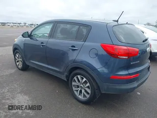 2014 Kia Sportage LX with VIN KNDPBCAC4E7585800, listed as a IAAI auction lot 42126740 with 193,573 mi miles and . Bid and sale history available at carsss.com. Image 3.