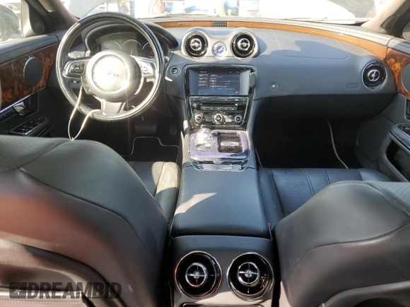 2011 Jaguar XJ with VIN SAJWA1CB4BLV05830, listed as a Copart auction lot 43007345 with 72,933 mi miles and Salvage title. Bid and sale history available at DreamBid. Image 8.