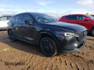 2022 Mazda CX-5 2.5 Turbo with VIN JM3KFBAY5N0647340, listed as a Copart auction lot 85123474 with 68,510 mi miles and Salvage Title. Bid and sale history available at carsss.com. Image 4.