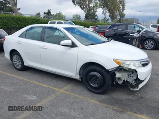 2014 Toyota Camry L with VIN 4T1BF1FK4EU403013, listed as a IAAI auction lot 42115089 with 221,686 mi miles and . Bid and sale history available at DreamBid. Image 1.