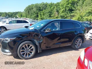 2018 Mazda CX-9 Grand Touring with VIN JM3TCBDYXJ0208962, listed as a IAAI auction lot 42629720 with 123,929 mi miles and . Bid and sale history available at DreamBid. Image 15.