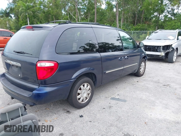 2007 Chrysler Town & Country Touring z VIN 2A4GP54L37R210162, wystawiony jako IAAI lot #42414404 z przebiegiem 276 516 mil mil oraz . Historia ofert i sprzedaży dostępna na DreamBid. Obrazek 4.