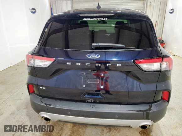 2021 Ford Escape SE z VIN 1FMCU0G67MUA73517, wystawiony jako Copart lot #58307575 z przebiegiem 122 216 mil mil oraz Czysty tytuł • Clean title. Historia ofert i sprzedaży dostępna na DreamBid. Obrazek 6.