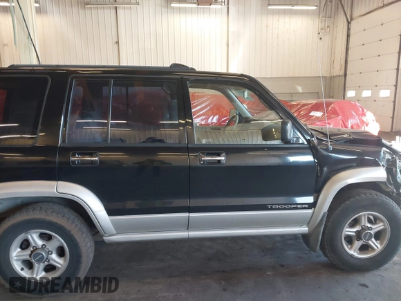 2001 Isuzu Trooper S with VIN JACDJ58X917J09299, listed as a IAAI auction lot 41296724 with 131,829 mi miles and . Bid and sale history available at DreamBid. Image 13.