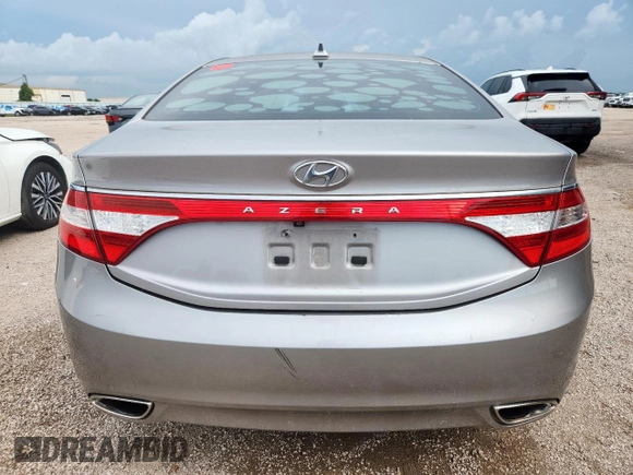 2013 Hyundai Azera z VIN KMHFG4JG9DA217664, wystawiony jako Copart lot #60855945 z przebiegiem 115 623 mil mil oraz Czysty tytuł • Clean title. Historia ofert i sprzedaży dostępna na DreamBid. Obrazek 6.
