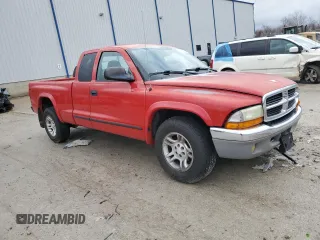2003 Dodge Dakota SLT with VIN 1D7HL42N93S105421, listed as a Copart auction lot 83088264 with 210,194 mi miles and Salvage Title. Bid and sale history available at carsss.com. Image 4.