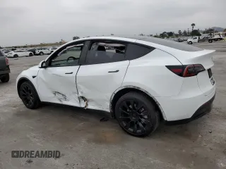 2022 Tesla Model Y Long Range z VIN 7SAYGDEE3NF481660, wystawiony jako Copart lot #54398215 z przebiegiem 48 587 mil mil oraz Szkoda całkowita • Salvage title. Historia ofert i sprzedaży dostępna na DreamBid. Obrazek 2.