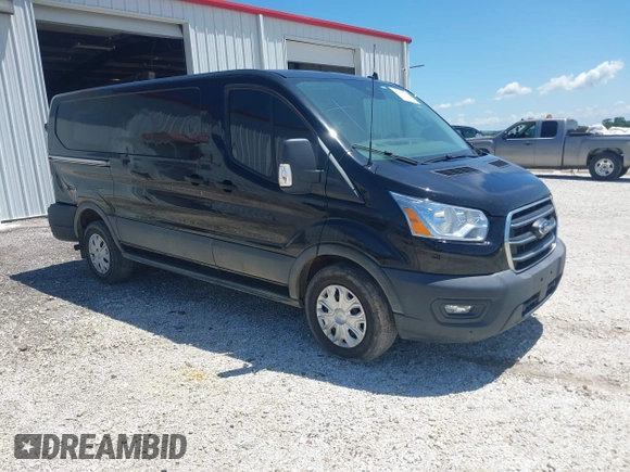2020 Ford Transit Cargo z VIN 1FTYE1Y89LKB76753, wystawiony jako IAAI lot #42468252 z przebiegiem 53 193 mil mil oraz . Historia ofert i sprzedaży dostępna na DreamBid. Obrazek 1.