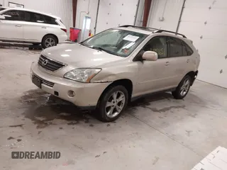 2007 Lexus RX 400h with VIN JTJGW31U272004112, listed as a IAAI auction lot 41193651 with 179,731 mi miles and . Bid and sale history available at DreamBid. Image 2.