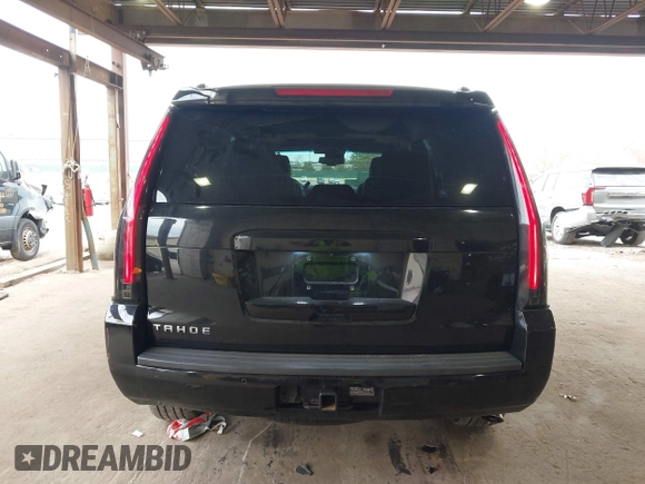 2015 Chevrolet Tahoe LT with VIN 1GNSKBKCXFR604401, listed as a IAAI auction lot 42048559 with 60,768 mi miles and . Bid and sale history available at DreamBid. Image 16.