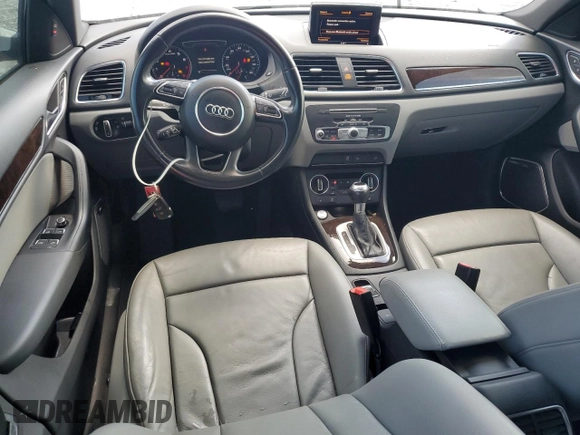 2016 Audi Q3 Prestige with VIN WA1FFCFS0GR007940, listed as a Copart auction lot 57384685 with 61,336 mi miles and Salvage title. Bid and sale history available at DreamBid. Image 8.