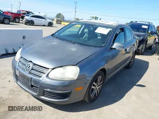 2005 Volkswagen Jetta z VIN 3VWDG71K35M613236, wystawiony jako IAAI lot #41764835 z przebiegiem Nie podano mil oraz . Historia ofert i sprzedaży dostępna na DreamBid. Obrazek 2.