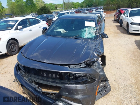 2018 Dodge Charger SXT Plus with VIN 2C3CDXHG6JH253191, listed as a IAAI auction lot 41988535 with 69,320 mi miles and . Bid and sale history available at carsss.com. Image 12.