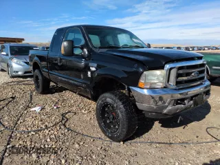 2003 Ford Super Duty F-250 XL with VIN 1FTNX21P03ED15381, listed as a Copart auction lot 44331695 with 140,802 mi miles and Salvage Title. Bid and sale history available at carsss.com. Image 4.