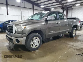 2012 Toyota Tundra with VIN 5TFUM5F11CX030865, listed as a Copart auction lot 63321195 with 292,994 mi miles and Salvage title. Bid and sale history available at DreamBid. Image 1.