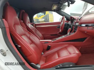 2013 Porsche Boxster с VIN WP0CA2A82DS113808, выставлен на аукционе Copart как лот 86105554 с пробегом 58 526 миль миль и Списание • Salvage title. История ставок и продаж доступна на DreamBid. Изображение 10.