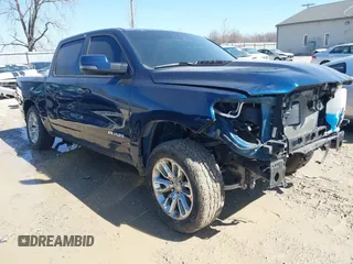 2023 Ram 1500 Laramie with VIN 1C6SRFJMXPN549423, listed as a IAAI auction lot 41817110 with 34,928 mi miles and . Bid and sale history available at DreamBid. Image 1.