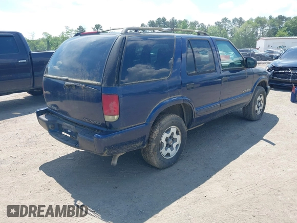 2002 Chevrolet Blazer LS z VIN 1GNDT13WX2K101236, wystawiony jako IAAI lot #42198292 z przebiegiem 193 731 mil mil oraz . Historia ofert i sprzedaży dostępna na DreamBid. Obrazek 4.