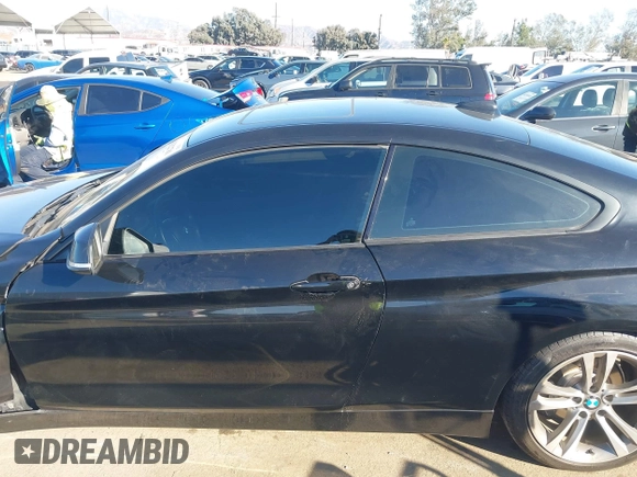 2014 BMW 4 Series 428i with VIN WBA3N7C55EK221259, listed as a IAAI auction lot 41322781 with 100,274 mi miles and . Bid and sale history available at carsss.com. Image 14.
