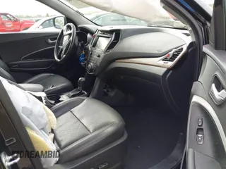 2018 Hyundai Santa Fe 2.0T z VIN 5NMZUDLA3JH057978, wystawiony jako IAAI lot #41930580 z przebiegiem 118 100 mil mil oraz . Historia ofert i sprzedaży dostępna na DreamBid. Obrazek 5.