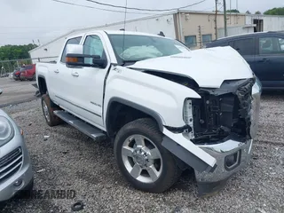 2016 GMC Sierra 2500HD SLT with VIN 1GT12TE82GF280333, listed as a IAAI auction lot 42485342 with 23,264 mi miles and . Bid and sale history available at DreamBid. Image 1.