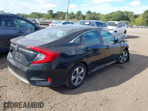 2019 Honda Civic LX with VIN 2HGFC2F65KH549993, listed as a IAAI auction lot 40394538 with 92,951 mi miles and . Bid and sale history available at DreamBid. Image 4.