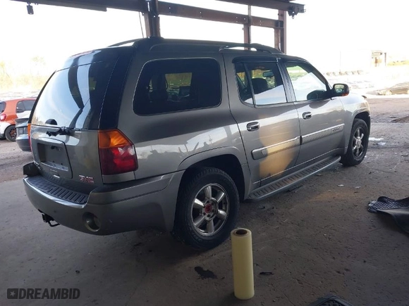 2005 GMC Envoy XL SLT with VIN 1GKET16S556177504, listed as a IAAI auction lot 41307581 with 131,102 mi miles. Bid and sale history available at carsss.com. Image 4.