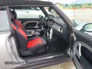 2006 MINI Convertible S with VIN WMWRH33556TL93023, listed as a IAAI auction lot 42744691 with 128,192 mi miles and . Bid and sale history available at DreamBid. Image 5.
