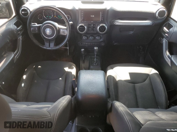 2016 Jeep Wrangler Unlimited Rubicon with VIN 1C4BJWFG5GL290757, listed as a Copart auction lot 52099225 with 102,424 mi miles and Salvage title. Bid and sale history available at DreamBid. Image 8.