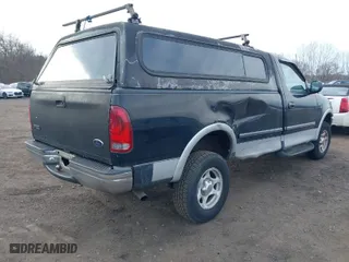 1998 Ford F-150 Standard with VIN 1FTZF18W0WNC16138, listed as a IAAI auction lot 41688951 with 354,669 mi miles. Bid and sale history available at carsss.com. Image 4.