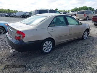 2004 Toyota Camry LE with VIN 4T1BF30K24U570599, listed as a IAAI auction lot 42107715 with 324,191 mi miles and . Bid and sale history available at DreamBid. Image 4.