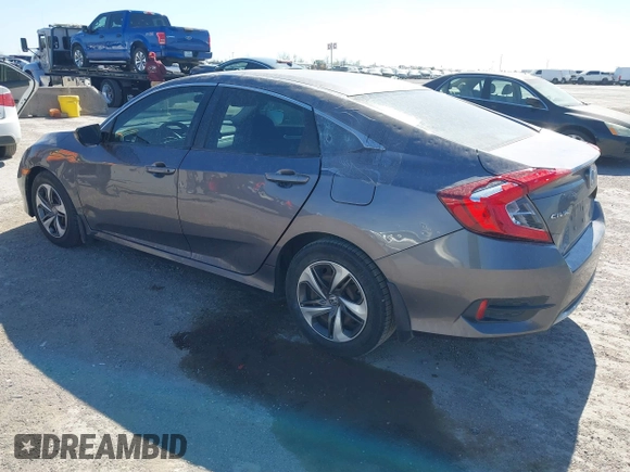 2019 Honda Civic Sedan LX with VIN 19XFC2F64KE005270, listed as a IAAI auction lot 41852238 with 106,604 mi miles. Bid and sale history available at carsss.com. Image 3.