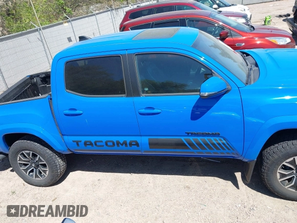 2020 Toyota Tacoma SR5 z VIN 3TMCZ5AN5LM337632, wystawiony jako IAAI lot #42203628 z przebiegiem 39 831 mil mil oraz . Historia ofert i sprzedaży dostępna na DreamBid. Obrazek 13.