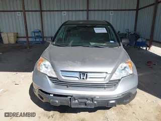 2007 Honda CR-V EX-L with VIN JHLRE387X7C069804, listed as a IAAI auction lot 41616256 with 136,271 mi miles. Bid and sale history available at carsss.com. Image 13.