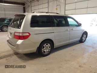 2006 Honda Odyssey EX-L with VIN 5FNRL387X6B449343, listed as a IAAI auction lot 42162759 with 242,590 mi miles. Bid and sale history available at carsss.com. Image 4.