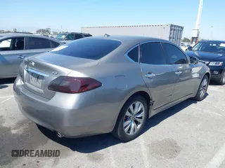 2011 Infiniti M with VIN JN1BY1AP7BM321776, listed as a IAAI auction lot 42320450 with 117,831 mi miles and . Bid and sale history available at DreamBid. Image 4.
