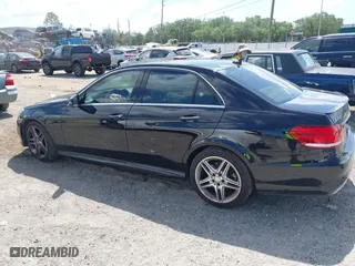 2014 Mercedes-Benz E-Class E 350 Luxury with VIN WDDHF8JB7EA791635, listed as a IAAI auction lot 41999708 with 133,509 mi miles. Bid and sale history available at carsss.com. Image 14.