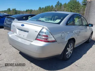 2008 Ford Taurus SEL with VIN 1FAHP24W18G115823, listed as a IAAI auction lot 42119435 with 57,867 mi miles. Bid and sale history available at carsss.com. Image 4.