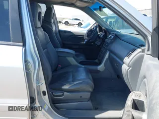 2005 Honda Pilot EX-L z VIN 2HKYF18515H550101, wystawiony jako IAAI lot #42182151 z przebiegiem 118 159 mil mil oraz . Historia ofert i sprzedaży dostępna na DreamBid. Obrazek 5.