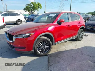 2020 Mazda CX-5 Touring with VIN JM3KFACMXL1819518, listed as a IAAI auction lot 41911679 with 50,357 mi miles and . Bid and sale history available at carsss.com. Image 2.