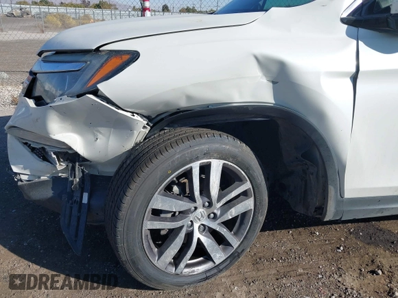 2017 Honda Pilot Elite with VIN 5FNYF6H02HB042160, listed as a IAAI auction lot 40893685 with Not Provided miles and . Bid and sale history available at DreamBid. Image 6.