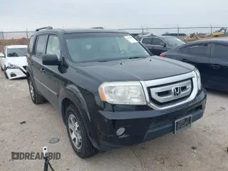 2009 Honda Pilot Touring z VIN 5FNYF388X9B024429, wystawiony jako IAAI lot #41924600 z przebiegiem 125 400 mil mil oraz . Historia ofert i sprzedaży dostępna na DreamBid. Obrazek 1.